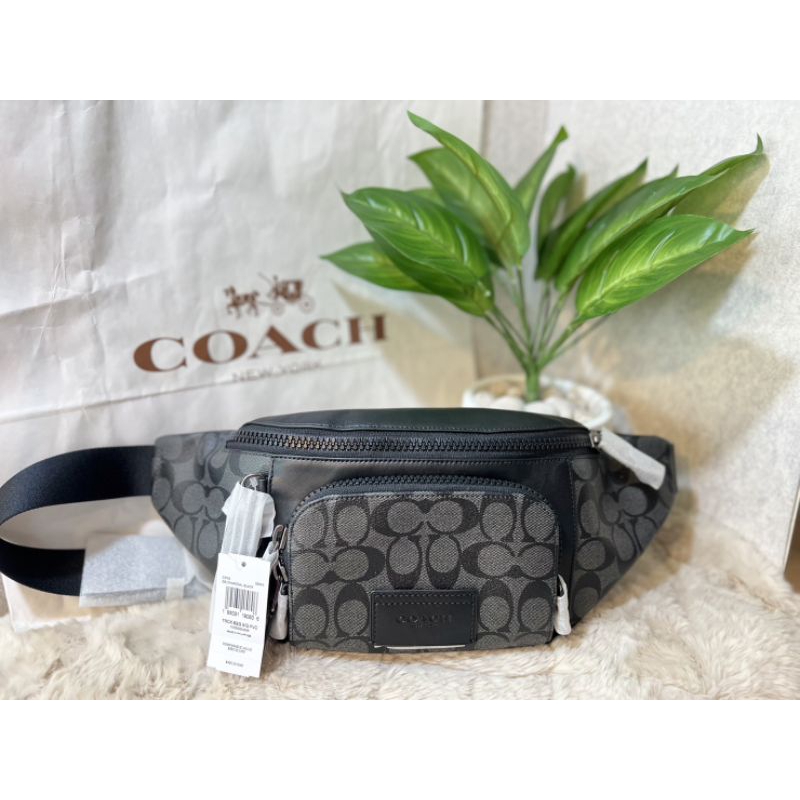 🎀กระเป๋าคาดอก Coach Track belt bag in signature canvan