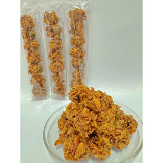 เมี่ยงกรอบ 21คำ นำส่วนผสมของเมี่ยงสดมาทำเป็นคำเคี่ยวจนกรอบ