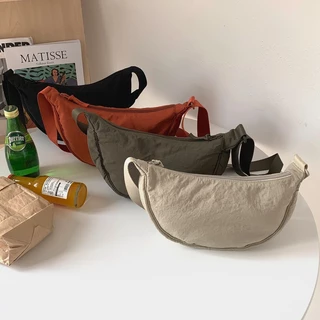 พร้อมส่ง มี39สีใหม่ กระเป๋า สไตล์ยูนิโคล Uniqlo Round Mini Shoulder Bag ผ้าไนลอน กระเป๋าคาดอก เบา