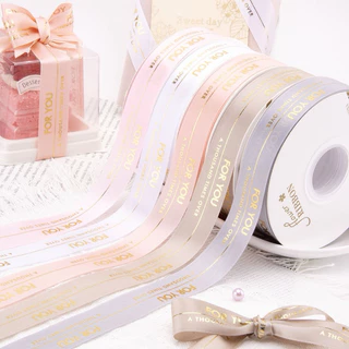 ริบบิ้นผ้าซาตินพิมพ์ทอง ลาย for you a thousand times over กว้าง 2.5 cm ยาว 40 หลา