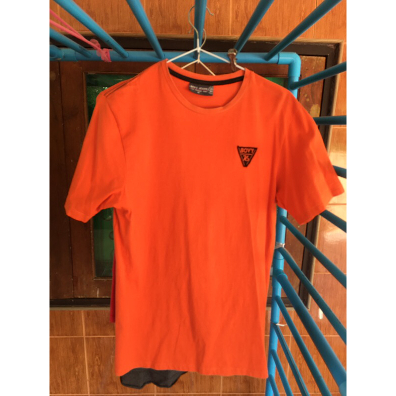 เสื้อยืด สีส้ม เบอร์ M ยี้ห้อ Bovy Jeans อก 40