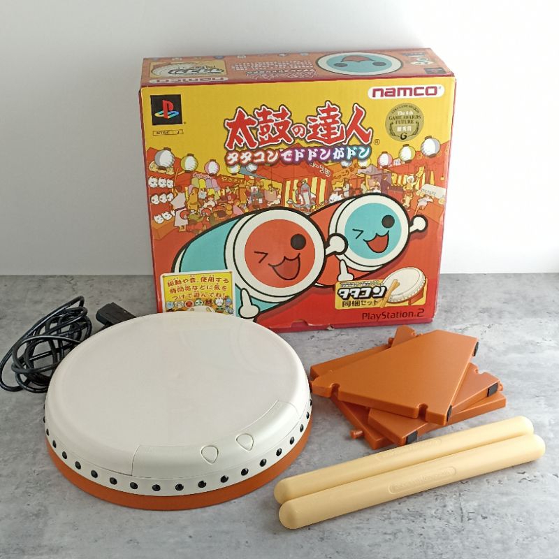 NAMCO >> ชุดเกม Taiko Drum แผ่นเกม+กลองสำหรับ PlayStation 2 (PS2) งานกล่อง ใช้งานปกติ สภาพสวย มือสอง