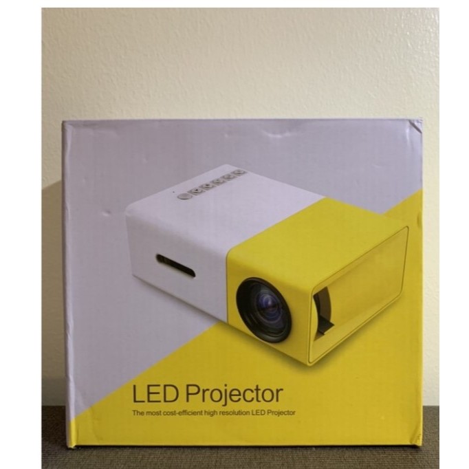 Mini Projector LED (YG300) (แถมฟรี สาย HDMI ต่อ Iphone/Ipad) โปรเจกเตอร์มินิขนาดพกพาสำหรับดูหนัง