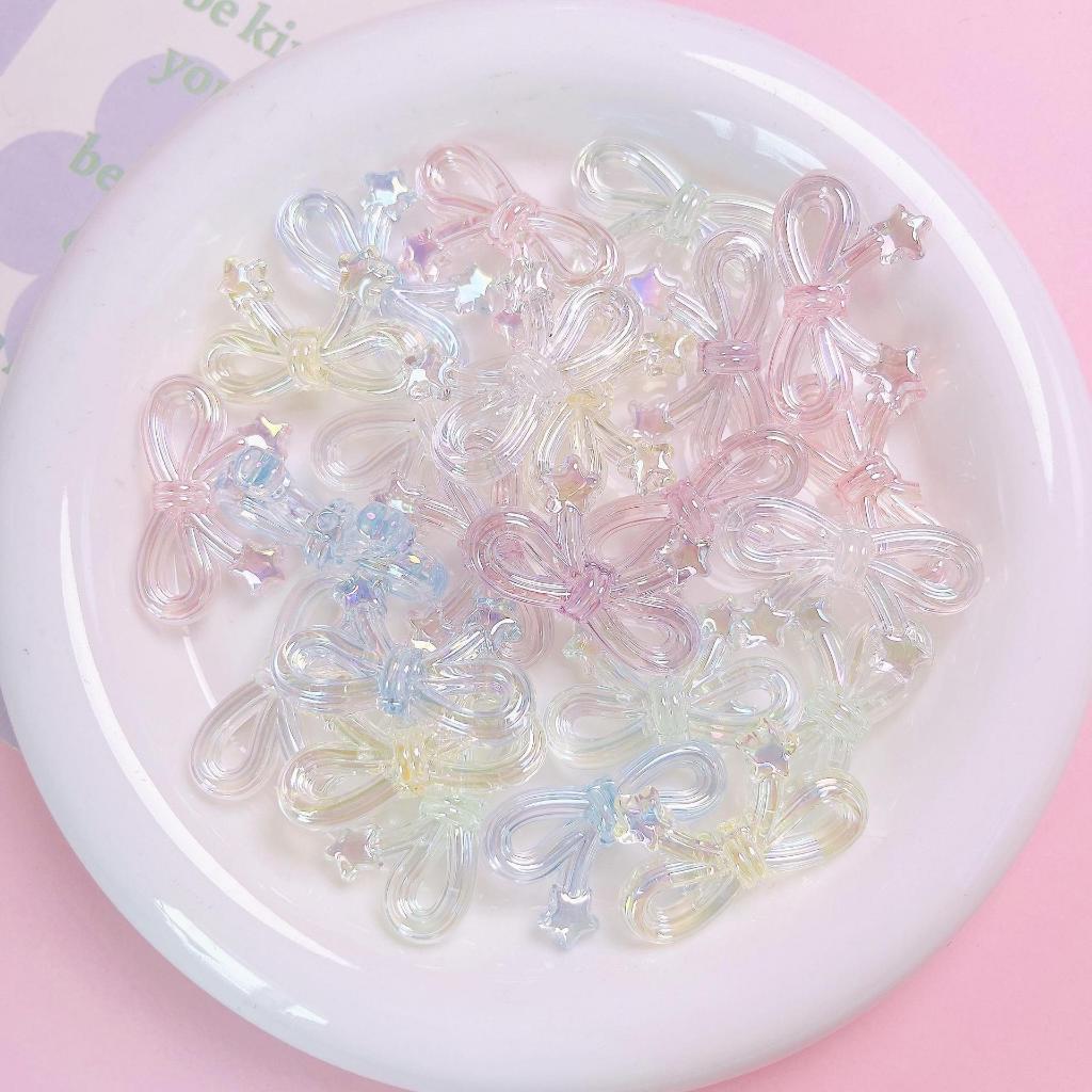 โบว์ หางดาว สีใส สีนม พาสเทล ขนาด 20x34mm อุปกรณ์งานฝีมือ งานร้อยกำไล สร้อย พวงกุญแจ ของตกต่างๆ DIY ราคา ถูกที่สุด ดีลบีเคเค แกลเลอรีภาพที่ 2