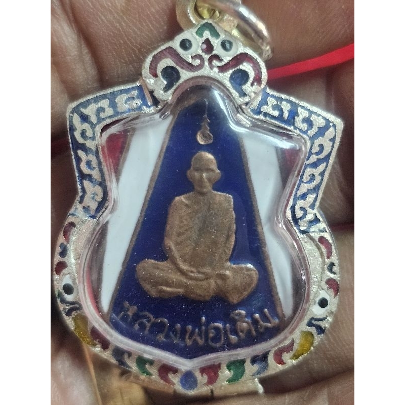 เหรียญหลวงพ่อเดิมวัดหนองโพจังหวัดนครสวรรค์ลายธงชาติพร้อมกรอบเงิน