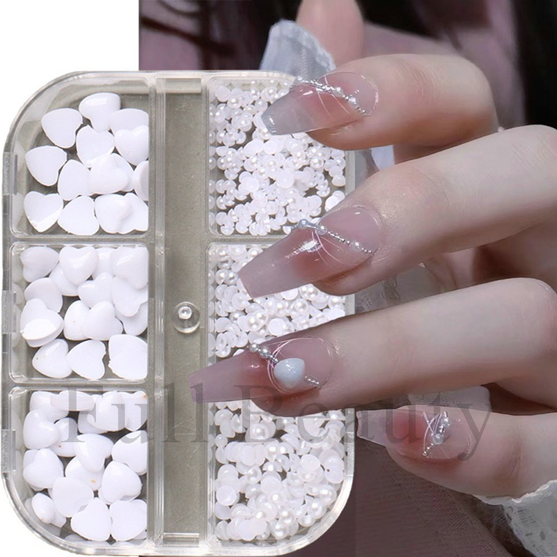 หัวใจตลับแต่งเล็บพร้อมมุกซีกคละไซ๊(หัวใจ45ชิ้น)