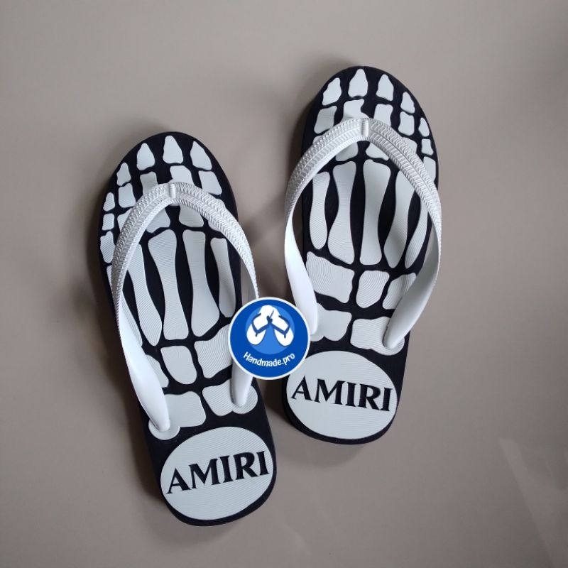 แกะลายกระดูกรองเท้าแตะนันยางช้างดาว