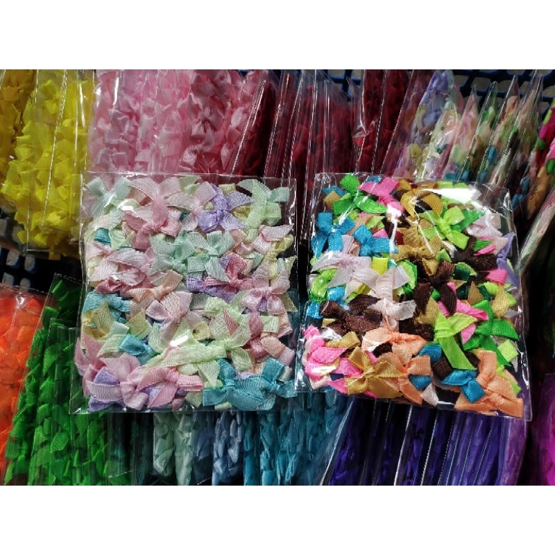 โบว์จิ๋ว ห่อละ100 ชิ้น คละสี / สีล้วน