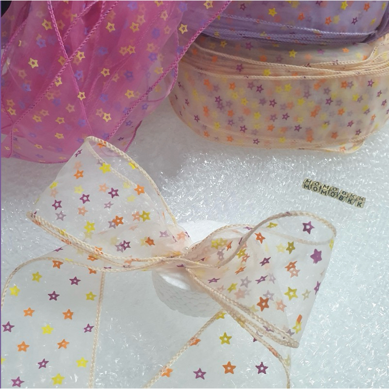 โบว์ผ้าแก้วลายดาว กว้าง 4-4.5 ซม. มีหลายสี สั่งยาวได้ค่ะ