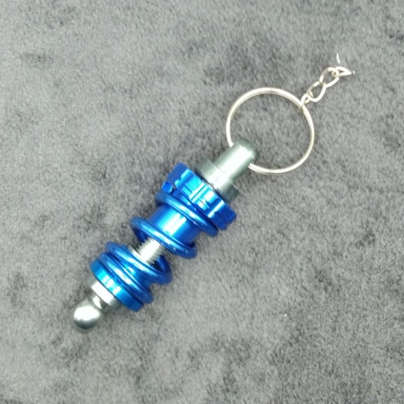 พวงกุญแจโช๊คอับ พวงกุญแจเท่ๆ ส่งจากประเทศไทย