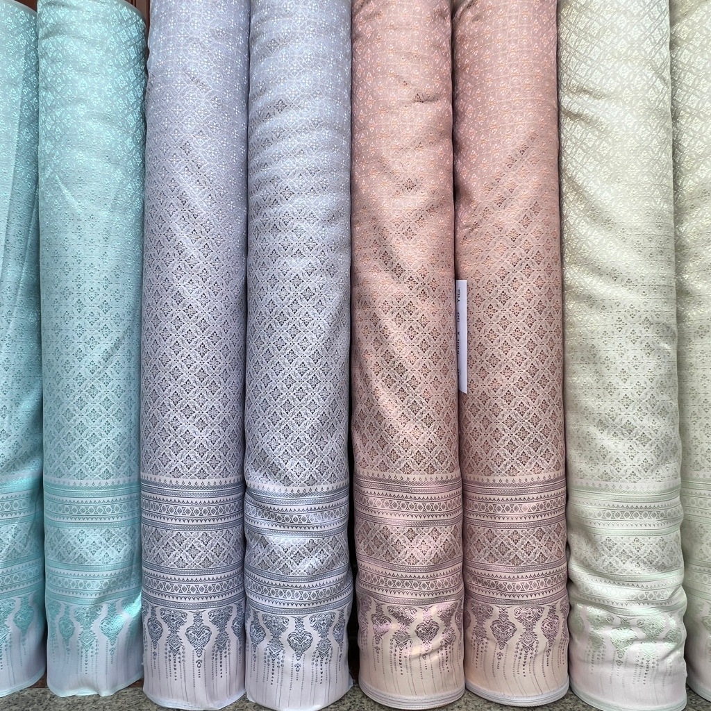 ผ้าไหมเทียมทอ ลายสร้อยการะเกด ลายพุ่มใหญ่ สีเหลือบ