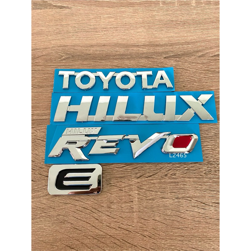 โลโก้ TOYOTA HILUX REVO E สีเงิน ราคาต่อชิ้น