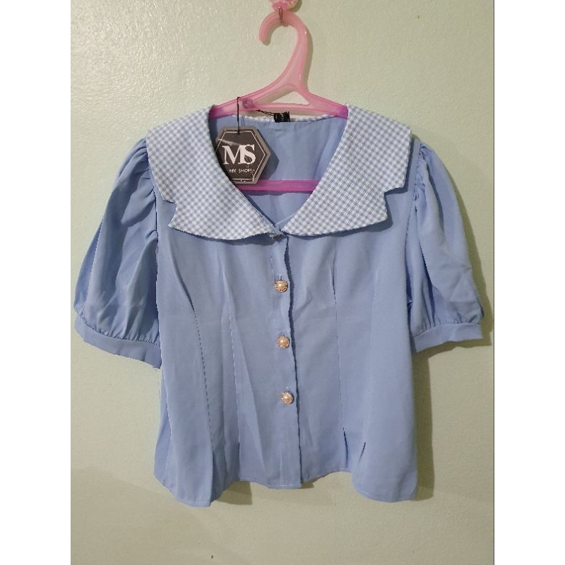 NB02 : เสื้อปกฟ้าลายตาราง