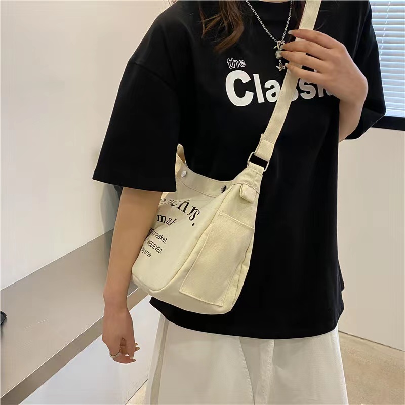 กระเป๋าสะพายข้างผ้าแคนวาสใส่ของได้เยอะมี 3 สีให้เลือก bag800