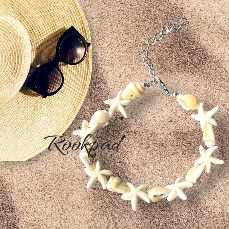 สร้อยข้อมือหอยขั้นจี้รูปปลาดาวราคาส่งชุด12เส้น