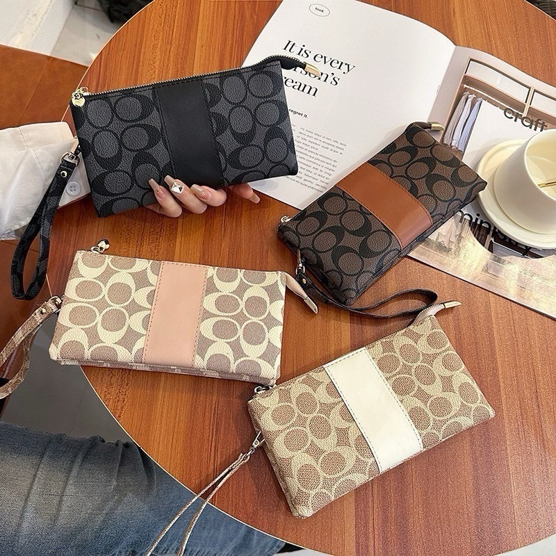 กระเป๋าเงินแบบซิป ลายสวย ช่องใส่ของ2ฝั่ง ช่องกลาง1มีช่องใส่บัตรด้านใน มาพร้อมที่คล้องมือ – โปรปัง