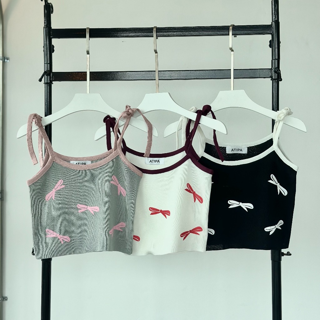 Atipashop - CRISTIE BOW เสื้อสายเดี่ยว ครอป สกรีนลายโบว์ สีทูโทน