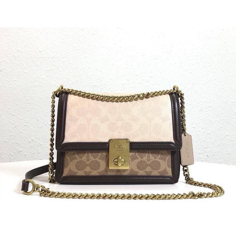 Coach Hutton Shoulder Bag In Blocked Signature