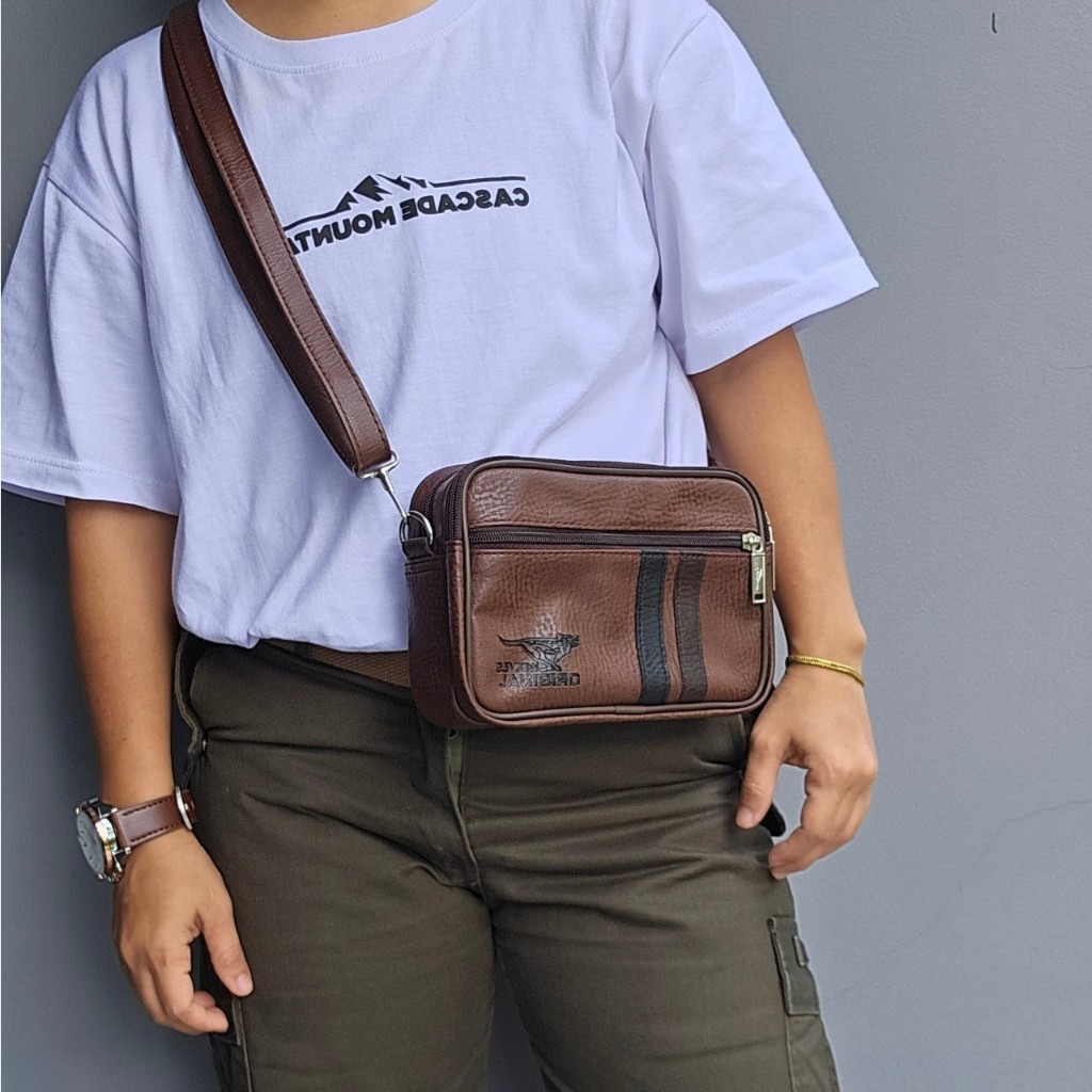 กระเป๋าอเนกประสงค์ คล้องเข็มขัดได้ มีสายสะพายสามารถสะพายได้หลายรูปแบบ หนังPU สายปรับสั้นยาวได้ แบรนด