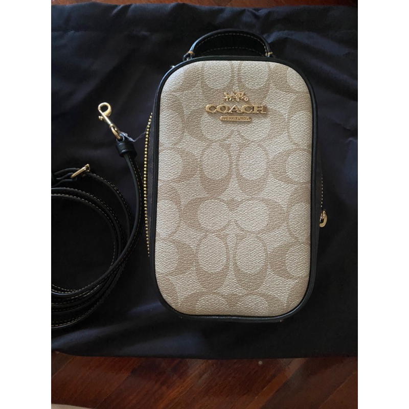 กระเป๋าใส่โทรศัพท์ coach ของแท้
