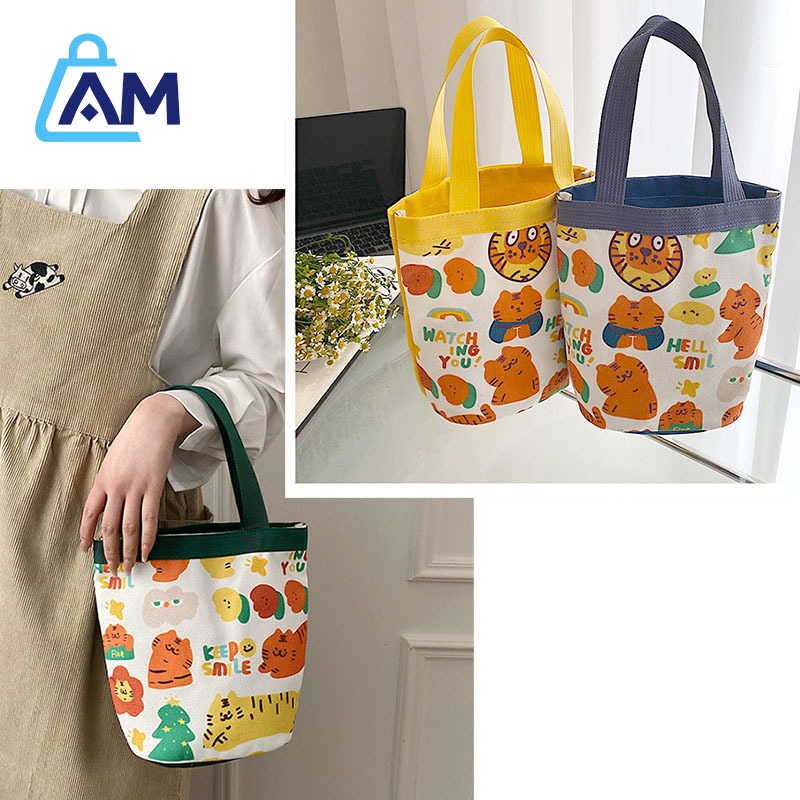 AmBag กระเป๋าแฟชั่นถือ คล้องแขนน่ารัก กระเป๋าทรงบัคเก็ต ใส่กล่องข้าว ขนาดพกพาสะดวก