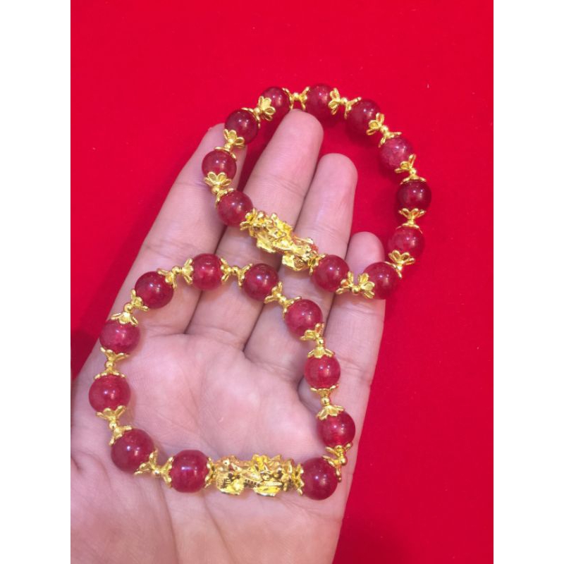 ข้อมือ ปี่เซียะ หุ้มทอง 96.5% สีหินทับทิมพม่า มีเลือดนก คั่นดอกพิกุลทอง สินค้าพรีเมี่ยม ไม่ลอก ไม่ดำ