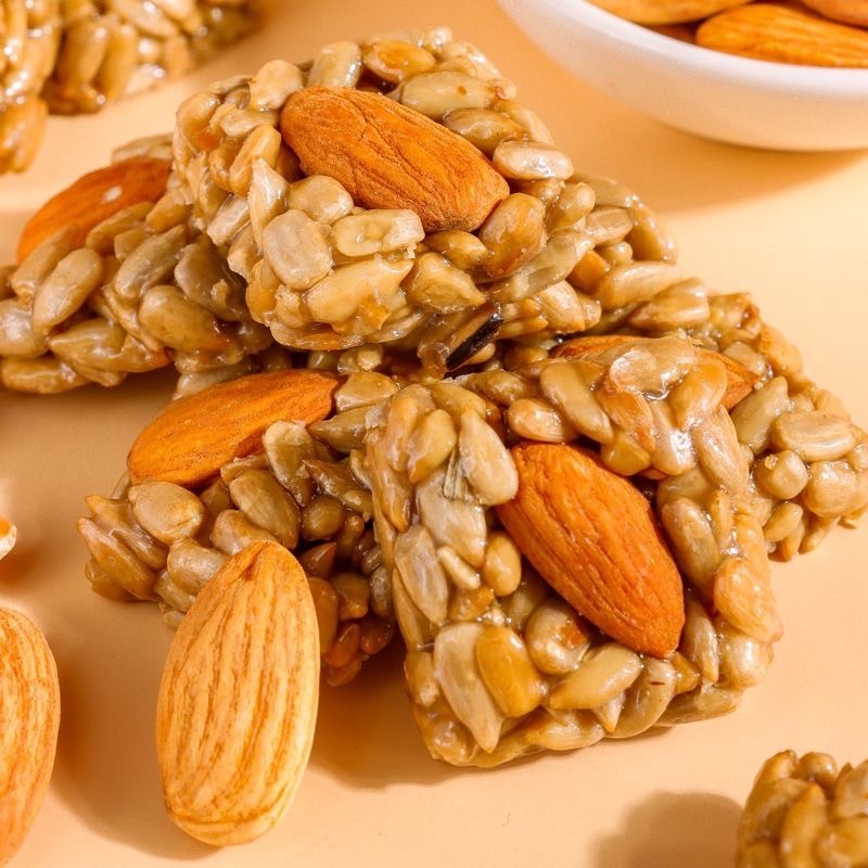 เมล็ดทานตะวัน(10ซอง) เมล็ดอัลมอนด์ ขนม ของว่างทานเล่นอร่อย 瓜子仁坚果酥 - รูปที่ 3