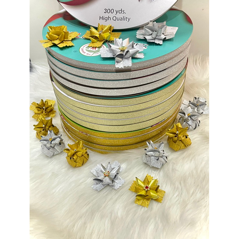 ริบบิ้นกากเพชรทึบ TW สีเงิน สีทอง ยาว 300 หลา ขนาด 12 มิล ราคาต่อ 1 ม้วน