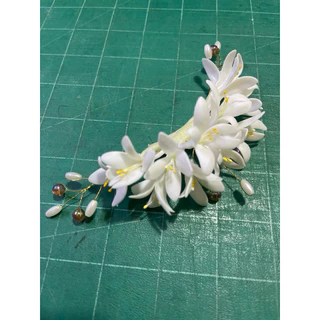 ดอกปีบติดผมดินปั้น(ไม่มีหวีเสียบ) มีห่วงไว้ติดกิ้ปเำให้ ดัดได้ ติดผมเจ้าสาว นางรำ รำย่าโม บ้านผ้าภูษามาส