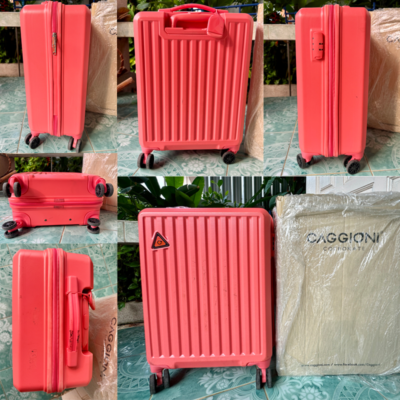 กระเป๋าเดินทางยี่ห้อ caggioni สีชมพูส้ม 22 นิ้ว มือ 2 มีถลอกบางจุด ไม่บุบ ใช้งานได้ มีกล่องให้ ภาพตามจริง พร้อมส่ง
