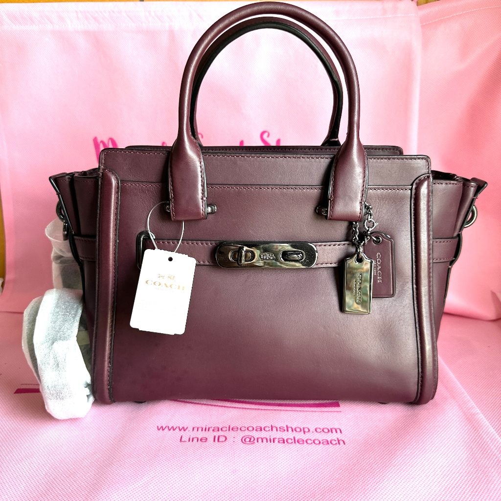 กระเป๋าถือ COACH แท้ รุ่นหรูที่สุด COACH 55496 SWAGGER 27 IN GLOVETANNED LEATHER BAG Oxblood