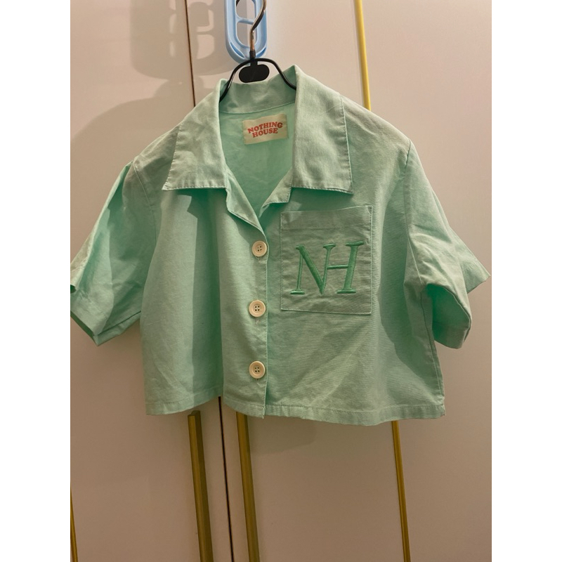 ครอบเชิ้ตเขียว nothing house