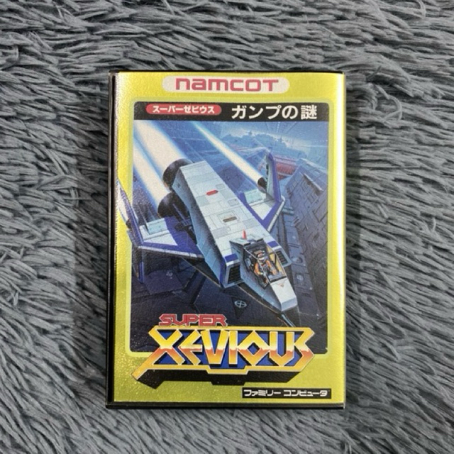 งานกล่องตลับแท้(สีทอง)เครื่อง Famicom เกมส์ Super Xevious ตลับเปิดติดง่าย มีใบปณ.สติกเกอร์และคู่มือ