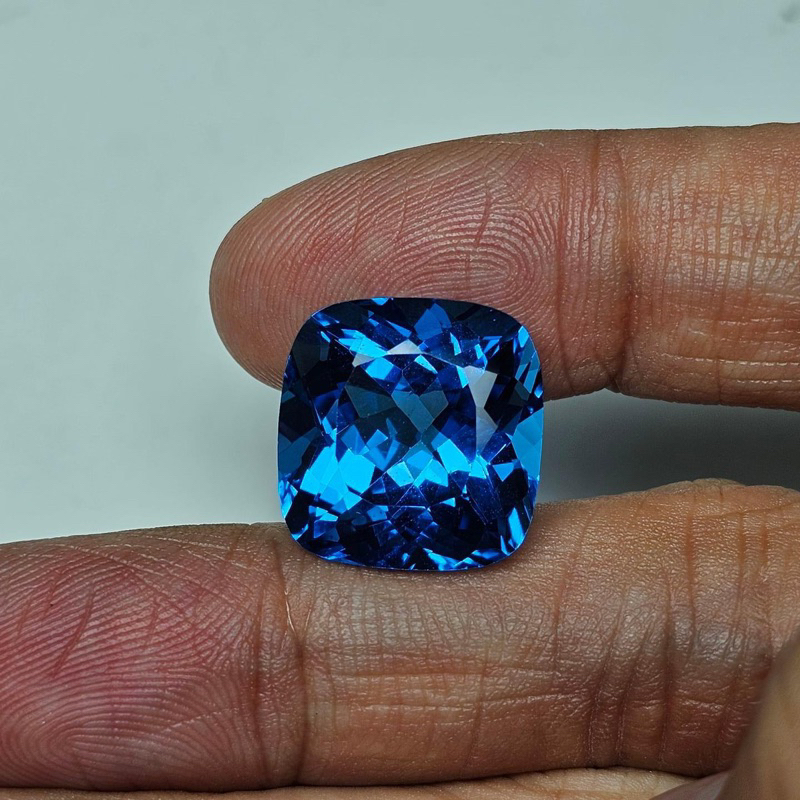 [ ส่งฟรี ] พลอยแท้ สวิตบลูโทพาส Swiss Blue Topaz คุชชั่น 26.03 กะรัต สีสวยพิเศษ พลอย โทพาส โทปาส อัญ
