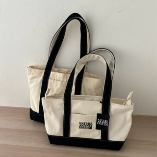 (ส่วนลดหน้าแอพหาไม่เจอทักแชทนะคะ🥰) two tone bag กระเป๋าผ้าแค…