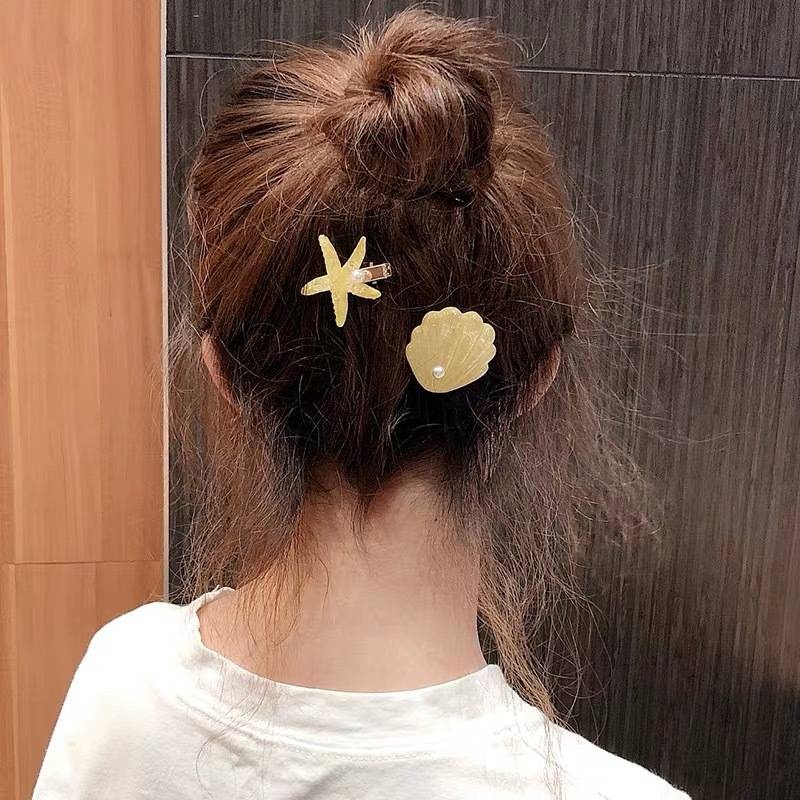 ในไทย💖กิ๊บติดผมปลาดาวเปลือกหอยประดับมุกสไตล์ฮาวายแฟชั่นฤดูร้อนสําหรับผู้หญิงหน้าม้าข้างคลิป.COD - รูปที่ 4