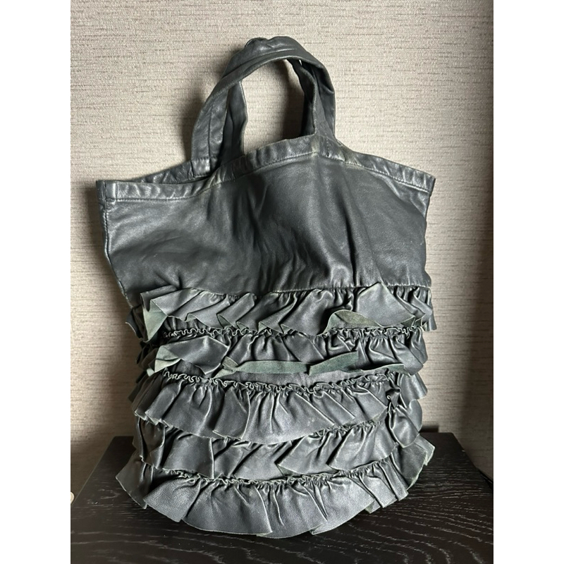 กระเป๋าหนังแท้ Comme des GARCONS