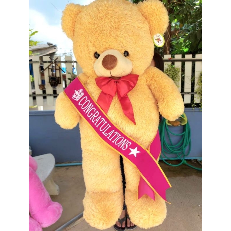 ตุ๊กตาหมีของขวัญรับปริญญา ให้บัณฑิต ขนปุย ตัวใหญ่1เมตร พร้อมสายสะพายคอนเกรท (เขียนการ์ดฟรี) – โปรปัง