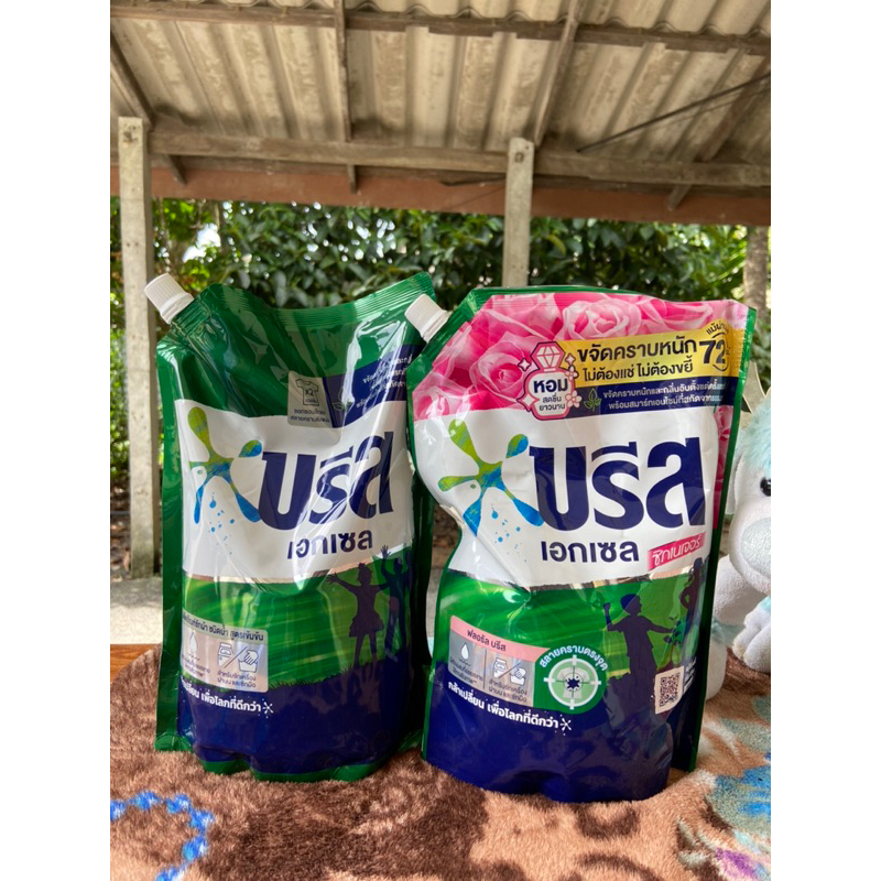 บรีสเอกเซล ผลิตภัณฑ์ซักผ้าสูตร น้ำสีเขียว, ชมพู ขนาด 1250มล
