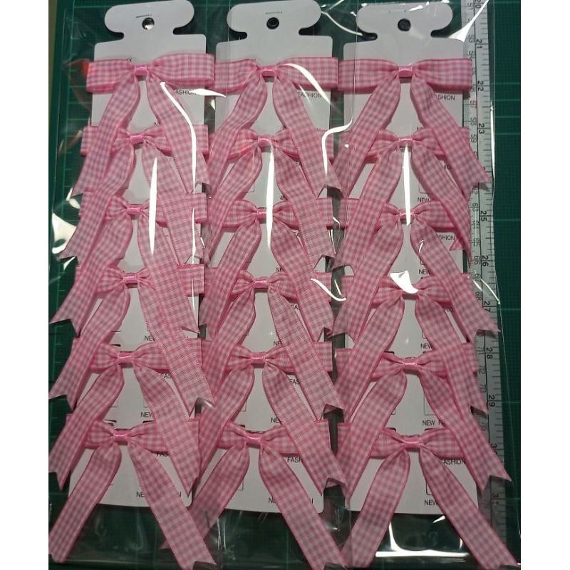 โบว์กิ๊ปสปริงลายสก๊อตสีชมพูขาวขนาดริบบิ้น 3/4" จำนวน 1 แพ็ค