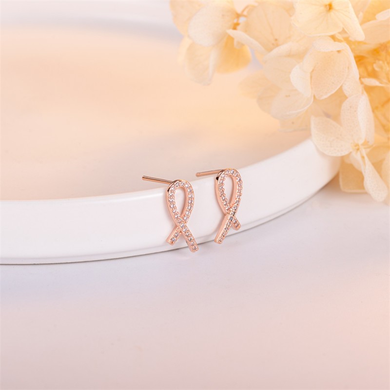 nnjew ต่างหู รุ่น Ribbon สี RoseGold ต่างหูแฟชั่น ผู้หญิง Model โบว์