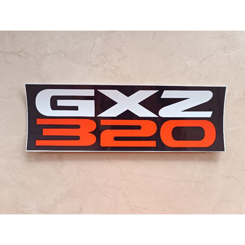 สติกเกอร์ GXZ 320 ติดข้างประตู ISUZU DECA320 ขนาด 8*24 cm. ราคาต่อ1ชิ้น