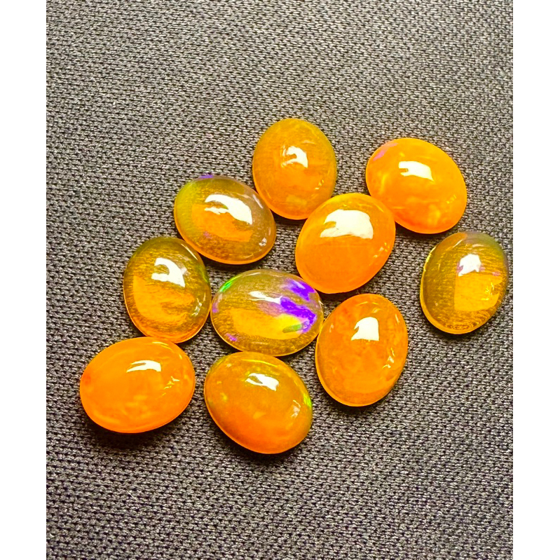 โอปอลสีส้ม ทรงรี 9x7 มม. พลอยธรรมชาติ 100% Orange opal 9x7mm oval shape 100% natural gemstone