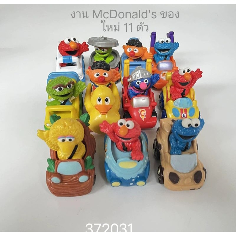 Sesame Street Racers Ernie, Big Bird, Cookie Monster and Elmo