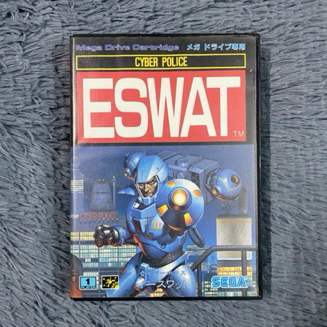 งานกล่องตลับแท้เครื่อง SEGA Mega Drive เกมส์ Cyber Police ESWAT โซน Japan ตลับเปิดติดง่าย คู่มือสวยต