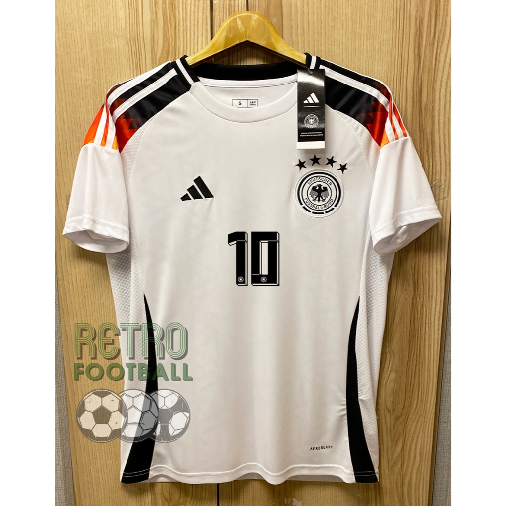 เสื้อฟุตบอลทีมชาติ เยอรมัน Home ชุดเหย้า ยูโร 2024 เกรดแฟนบอล [ 3A ] สีขาวพร้อมชื่อเบอร์นักเตะ ตรงปกแน่นนอน