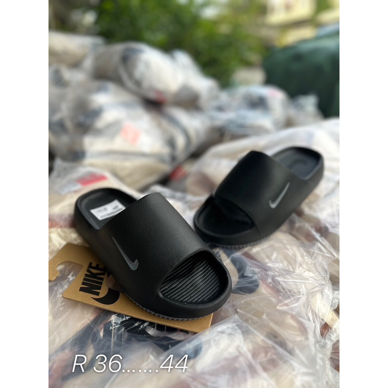 ร้องเทาแตะNikee calm slidesสำหรับผู้หญิง-ผู้ชายนำหนักเบาดีใส่สบายมีเบอร์36…44มีสินค้าพร้อมส่งทุกวัน