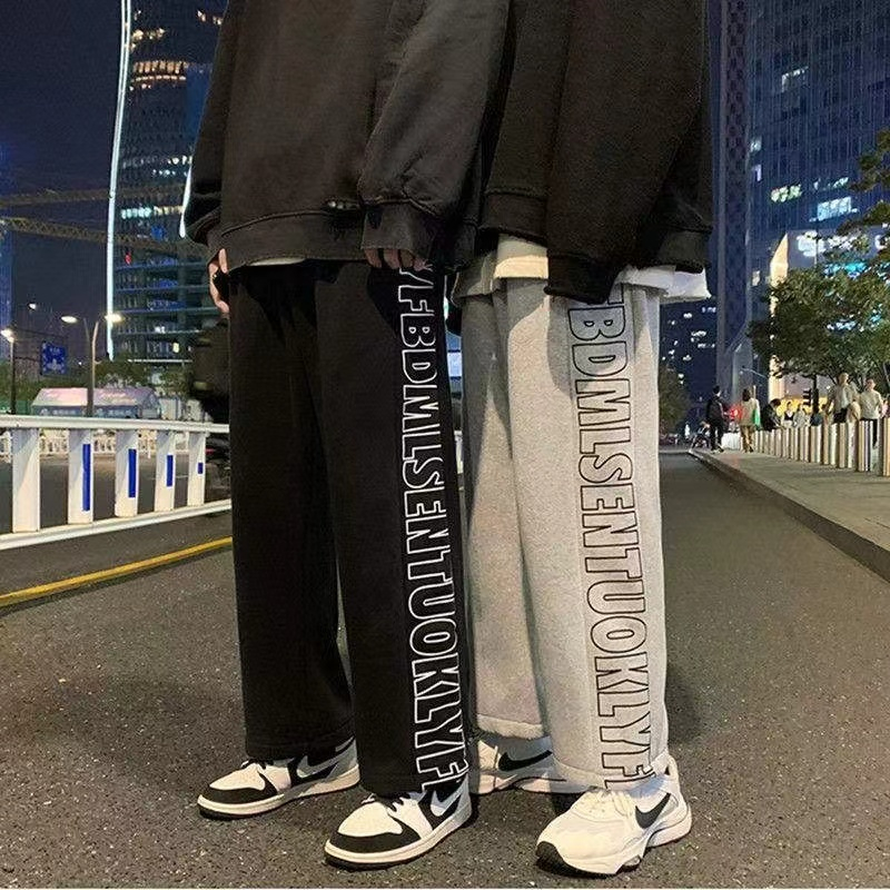 M-5XL กางเกงขายาวสำหรับผู้ชายกางเกงหลวมเอวยางยืดสไตล์เกาหลีสตรีทแฟชั่นกางเกงคู่กางเกงเอวสูงตรง