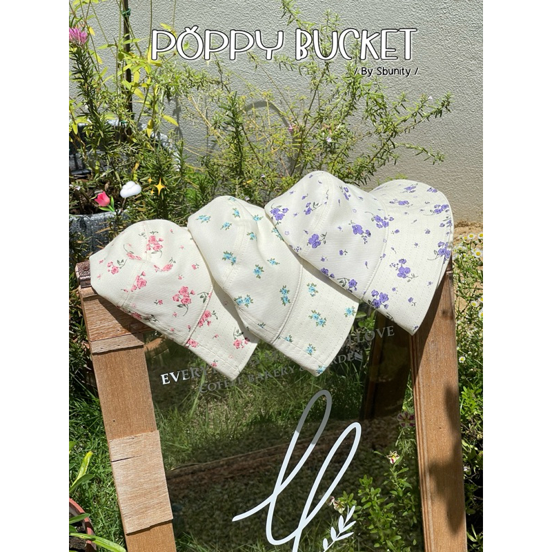 Poppy Bucket - หมวกบัคเก็ตพิมพ์ลายดอกไม้ สุดคิ้วท์