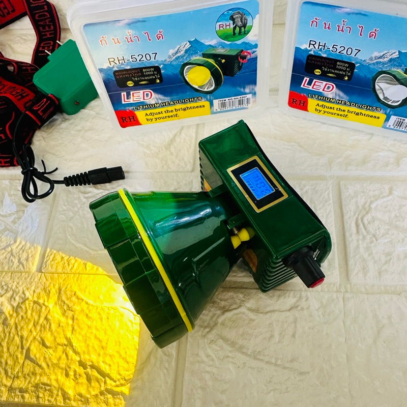 ไฟฉายคาดหัว ตราช้าง RH 5207 (LED 800w)แบตเตอรี่3000แอมป์ /PAE รุ่น 581 LED  200W. สวิตช์หรี่ปรับไฟได้ ใช้งานลุยฝนได้